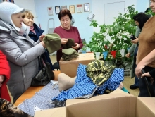 Ачинские волонтёры, изготавливающие маскировочные сети для СВО, посетили село Большой Улуй. 5